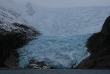 El glaciar Italia abrazando las laderas escarpadas de­­l Can­al Beagle­­­